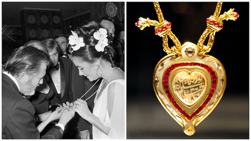 Elizabeth Taylor shows off her "Taj Mahal" necklace. | A close-up of the diamond necklace.