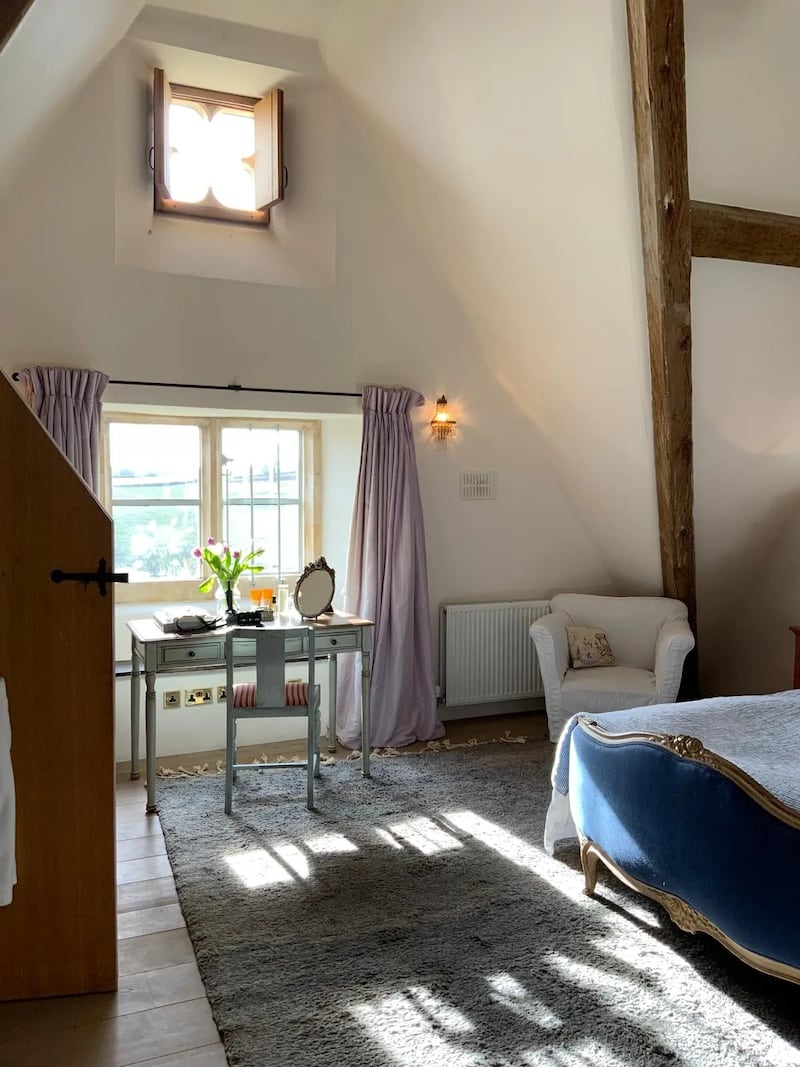 The Lilac Room, with its taffeta ball skirt curtains.