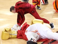 Conor McGregor and Mascot Burnie of the Miami Heat perform during halftime against the Denver Nuggets during Game Four of the 2023 NBA Finals on June 9, 2023.