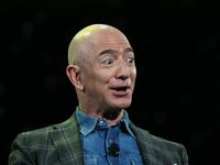 Jeff Bezos addresses the audience during a keynote session at the Amazon Re:MARS conference on robotics and artificial intelligence at the Aria Hotel in Las Vegas, Nevada on June 6, 2019.