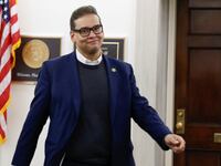 Rep. George Santos (R-NY) returns to his office after telling a Republican party conference that he will recuse himself from House committee assignments on Capitol Hill in Washington, DC.