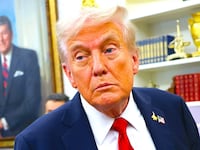 President Donald Trump listens to a question from a reporter after announcing a deal with Pfizer to lower Medicaid drug prices in the Oval Office of the White House on September 30, 2025 in Washington, DC. T