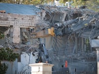 Workers demolished the facade of the East Wing of the White House on October 20.