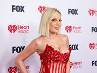 HOLLYWOOD, CALIFORNIA - MARCH 26: Tori Spelling attends the 2026 iHeartRadio Music Awards at Dolby Theatre on March 26, 2026 in Hollywood, California.