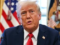 US President Donald Trump speaks to the press as he signs an executive order to create a US sovereign wealth fund, in the Oval Office of the White House on February 3, 2025, in Washington, DC.