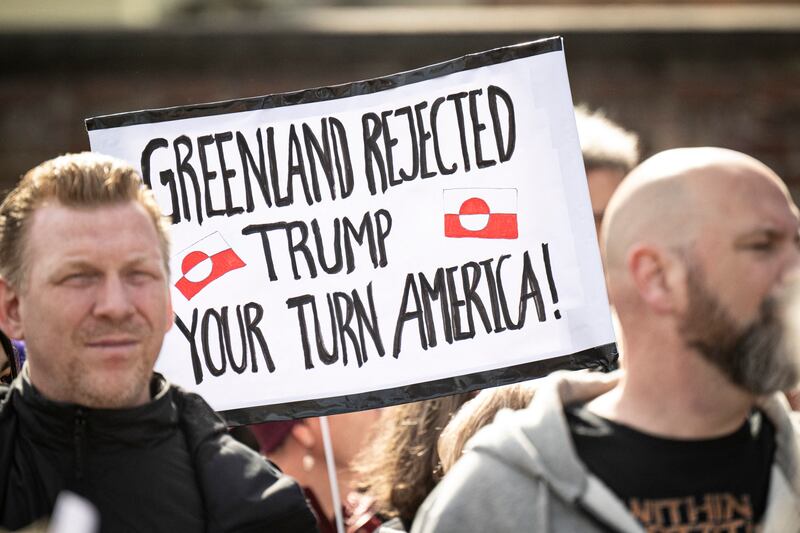 People protest against the American pressure taking place against Greenland and Denmark, in front of the American Embassy in Copenhagen on March 29, 2025. Denmark said on March 29, 2025 it did not like the "tone" of US Vice-president JD Vance after he accused Copenhagen of under-investing in Greenland during a visit to the Danish territory.