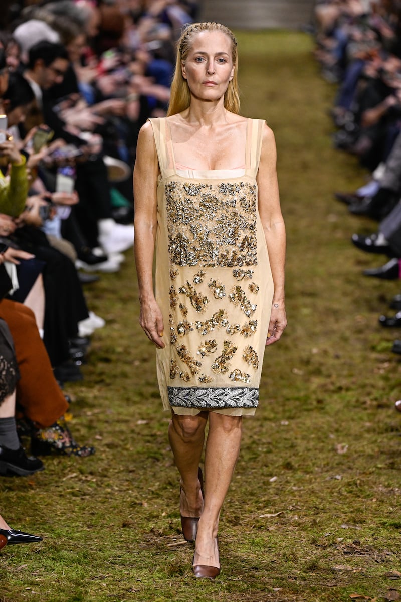Gillian Anderson walked down the runway confidently at the Miu Miu fashion show at Place d'Iéna during Paris Fashion Week 2026.