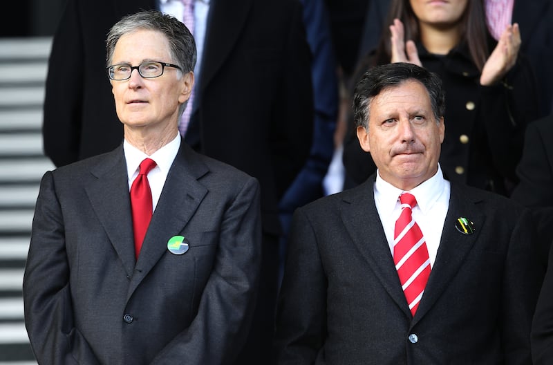 Liverpool FC's new owners John W Henry (left) and Thomas (Tom) Werner (right) of NESV in the stands prior to kick-off (Photo by Mike Egerton - PA Images via Getty Images)