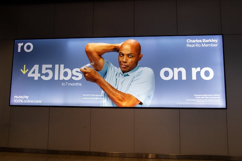 NEW YORK, NY - MAY 31: General view of a digital billboard with former NBA player Charles Barkley advertising Ro and weight loss from GLP-1 medication at New York Moynihan Train Hall At Penn Station on May 31, 2026, in New York, NY. Ro is a telehealth company that has multiple GLP-1 options and provides services nationwide. (Photo by Erica Denhoff/Icon Sportswire via Getty Images)