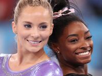 MyKayla Skinner and Simone Biles smiling together at the 2020 Tokyo Olympics.