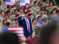 U.S. President Donald Trump pumps his fist.