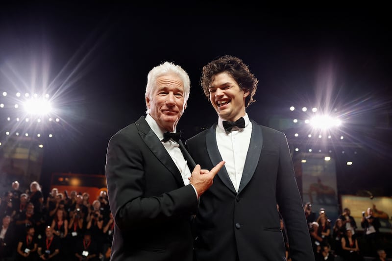 Richard Gere and his son Homer James Jigme Gere pose during the 81st Venice Film Festival, in Venice, Italy, September 1, 2024. REUTERS/Louisa Gouliamaki