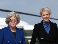 JOINT BASE ANDREWS, MARYLAND - OCTOBER 16: White House Chief of Staff Susie Wiles (C) and Executive Assistant to U.S. President Donald Trump Natalie Harp (R) board Air Force One on October 16, 2026 at Joint Base Andrews, Maryland. Trump is traveling to Georgia to headline a campaign rally for Republican Senate candidate Rep. Mike Collins (R-GA), who is running against incumbent Sen. Jon Ossoff (D-GA). (Photo by Eric Lee/Getty Images)