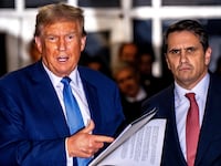 Former President Donald Trump speaks alongside his attorney Todd Blanche at Manhattan Criminal Court in New York City.
