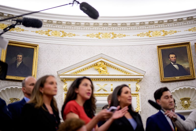 Paintings and gold trim are visible behind reporters as U.S. President Donald Trump holds a swearing in ceremony for interim U.S. Attorney for Washington, D.C. Jeanine Pirro in the Oval Office of the White House on May 28.