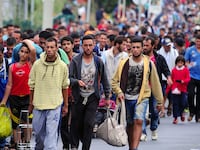articles/2015/09/05/refugees-on-the-march-in-hungary-believe-they-will-overcome/150905-rosenfeld-hungary-migrants-tease_hjhbm4