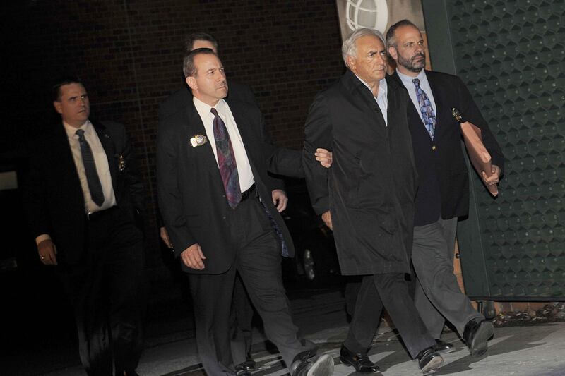 articles/2011/07/01/dominique-strauss-kahn-freed-time-to-ban-perp-walk-photos/perp-walk-dsk-dokoupil_fpwwie