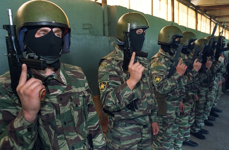Masked members of the special forces of the Russian Dzerjinski Tank division called VYMPEL, display their weapons during a training exercise. VYMPEL, also known as Vega Group or Spetsgruppa V, is a secretive Russian counter-terrorism unit formed in 1981 by KGB Gen. Drozdov.