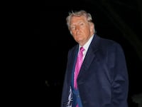 President Donald Trump walks on the South Lawn upon returning to the White House in Washington, DC, on March 29, 2026. Trump is returning from a weekend at his Mar-a-Lago resort.