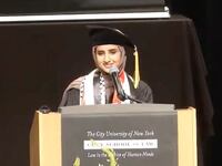 Fatima Mousa Mohammed delivering her speech at the CUNY law school graduation.