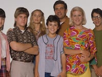 Danica McKellar, Jason Hervey, Olivia d'Abo, Fred Savage, Dan Lauria, Alley Mills, and Josh Saviano in The Wonder Years.