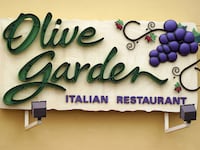 The sign outside an Olive Garden restaurant.