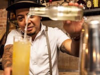 articles/2016/10/21/mamie-taylor-is-the-original-moscow-mule/162010-bartender-in-focus-pouring-tease_arxvvc