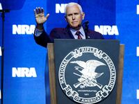 Mike Pence speaks at a podium at the 2023 NRA convention.