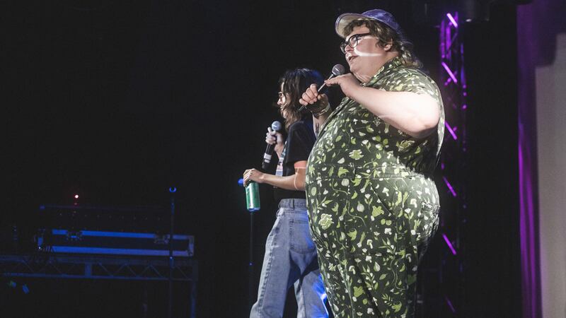 The comedy duo Girl God performs a stand-up show
