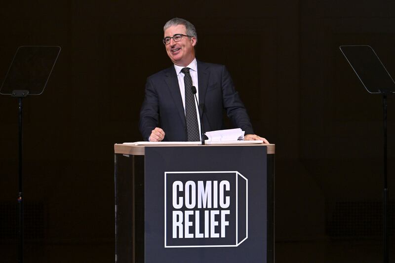 NEW YORK, NEW YORK - DECEMBER 10: John Oliver performs onstage during the Comic Relief Live 2025: A Benefit to Build Brighter Futures for Kids at Carnegie Hall on December 10, 2025 in New York City.