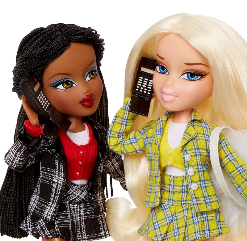 Bratz x Clueless dolls Cher and Dionne are pictured with flip phones from the release.