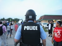articles/2014/11/26/the-disappearing-cops-of-east-st-louis/141126-glawe-ferguson-police-tease_bwtikz