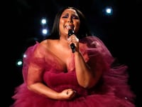 A picture of Lizzo, who is reportedly no longer in the mix to perform at the 2024 Super Bowl LVIII Halftime Show in light of the bombshell lawsuit accusing her of creating a hostile work environment.