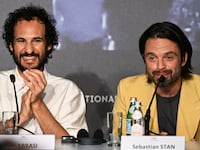 Iranian director Ali Abbasi and U.S. actor Sebastian Stan attend a press conference for the film \"The Apprentice\" during the 77th edition of the Cannes Film Festival in Cannes, southern France, on May 21, 2024.
