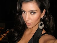articles/2015/05/08/the-shameful-bliss-of-kim-kardashian-s-selfie-book/150507-teeman-kimk-tease1_g5fuyw
