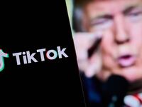 TikTok logo in front of a picture of President-elect Donald Trump.
