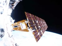 A view of the Link spacecraft over Earth.
