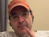 Gonzalo Lira speaks in a YouTube video.