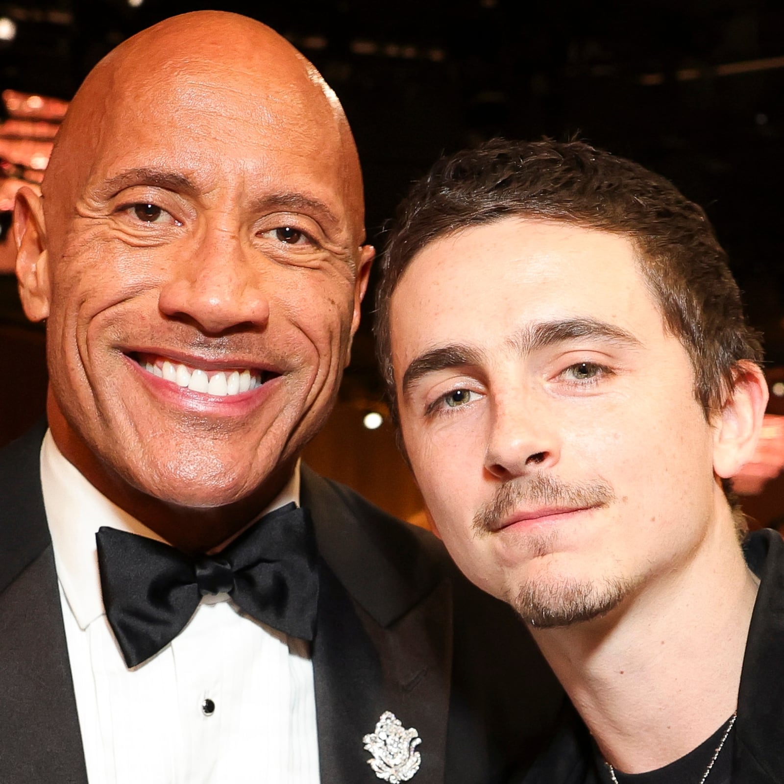 Dwayne Johnson and Timothée Chalamet attend the 83rd Annual Golden Globe Awards