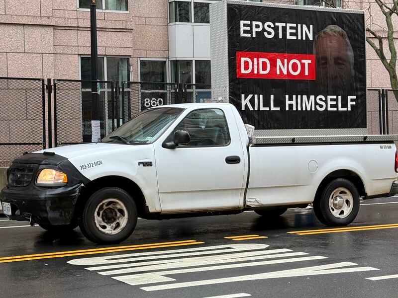 Truck with screen: "Epstein Did Not Kill Himself."