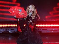 articles/2016/03/26/is-madonna-really-having-a-meltdown-or-are-we-just-sexist/160325-fallon-madonna-tease_xcd4bu