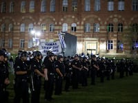 Law enforcement officers take position before entering the pro-Palestinian protest encampment at UCLA, as the conflict between Israel and the Palestinian Islamist group Hamas continues, in Los Angeles, California, U.S., May 1, 2024.