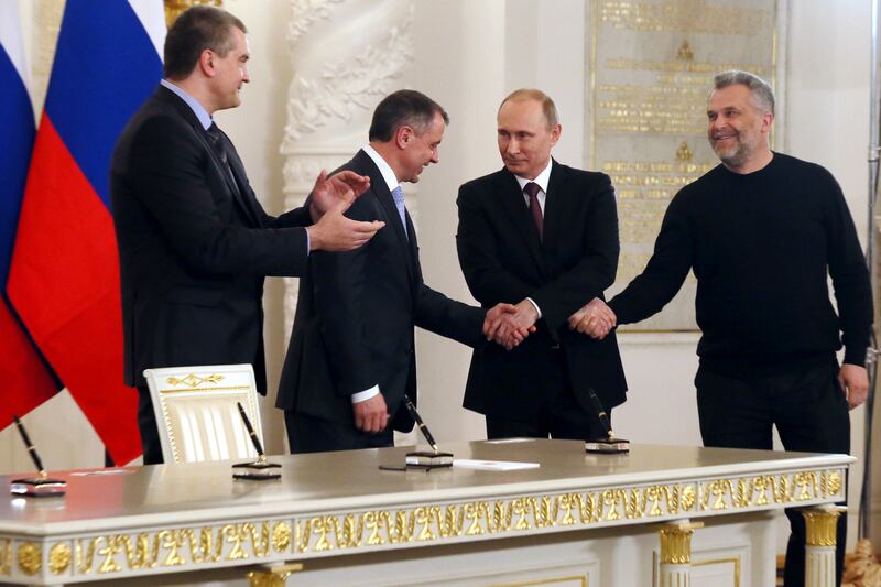 articles/2014/03/18/vladimir-putin-s-seizure-of-crimea-is-based-on-pure-fiction/140318-rus-crimea-1_jmo3ri