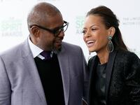 Forest Whitaker smiles alongside his ex-wife Keisha Nash in 2014, when they were still together.