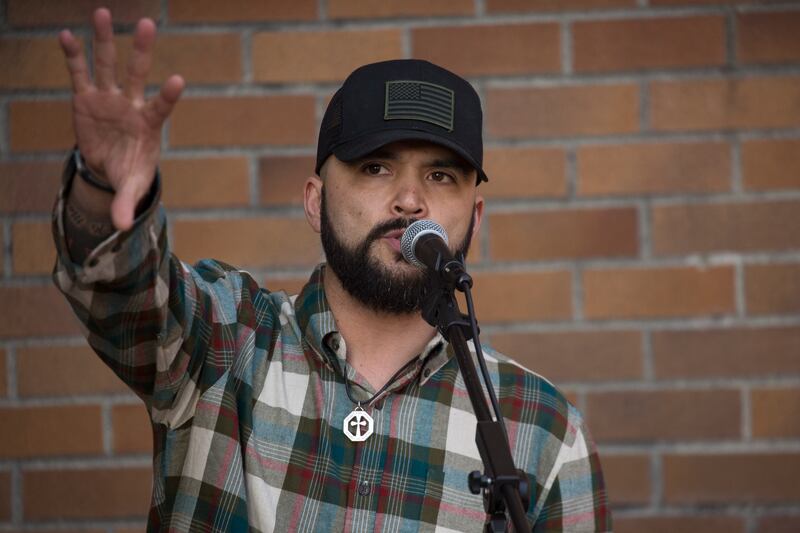 Joey Gibson, the founder of Patriot Prayer, speaks during a Patriot Prayer rally that was met by counter-protestors at the University of Washington on February 10, 2018 in Seattle, Washington.