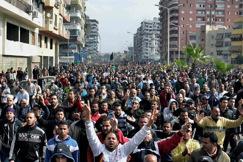 articles/2013/01/29/egyptians-defy-curfew-as-army-warns-of-collapse/130129-salama-giglio-port-said-tease-embed_hesqjl