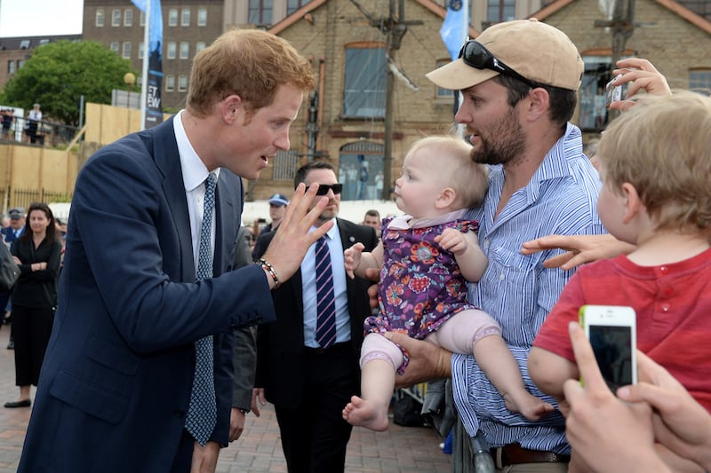 articles/2013/10/05/prince-harry-meets-australian-pm-s-not-bad-looking-daughters/harry-baby_dodl6l
