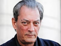 U.S. author Paul Auster poses for a photograph before an interview in Stockholm May 10, 2011.