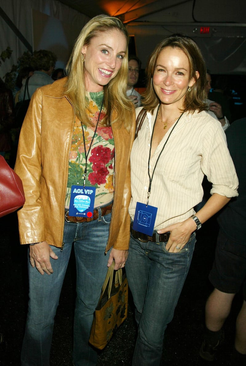 Tracy Pollan and her best friend, Jennifer Grey, are photographed during a 2003 Dave Matthews Band concert in Central Park.