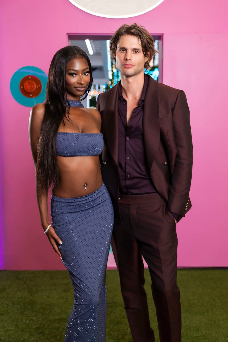Love Island stars, Trinity Celeste Tatum and Bryce Alakai Dettloff, pose for a promotional picture together in season 8.